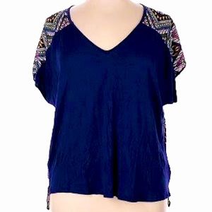 Pixley size medium blue with colorful chevron on back. Back is a silky material